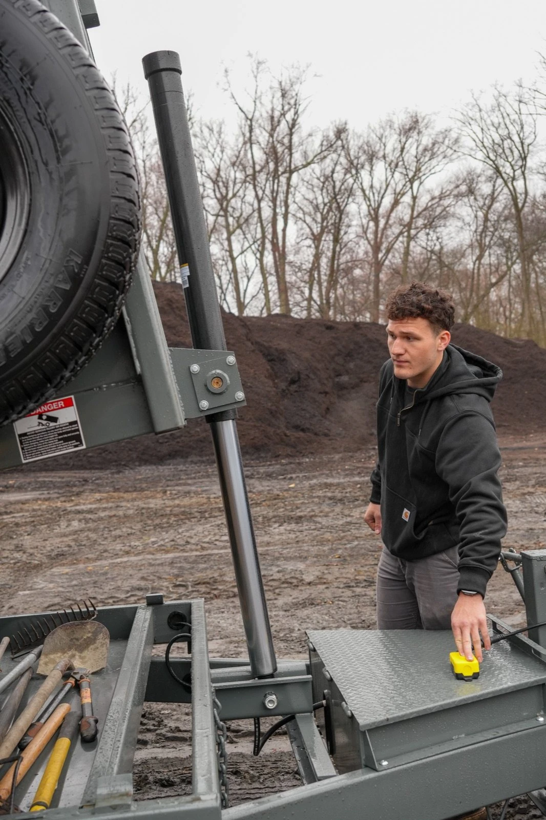 Jakub Miklus with the trailer at a soil and stone yard
