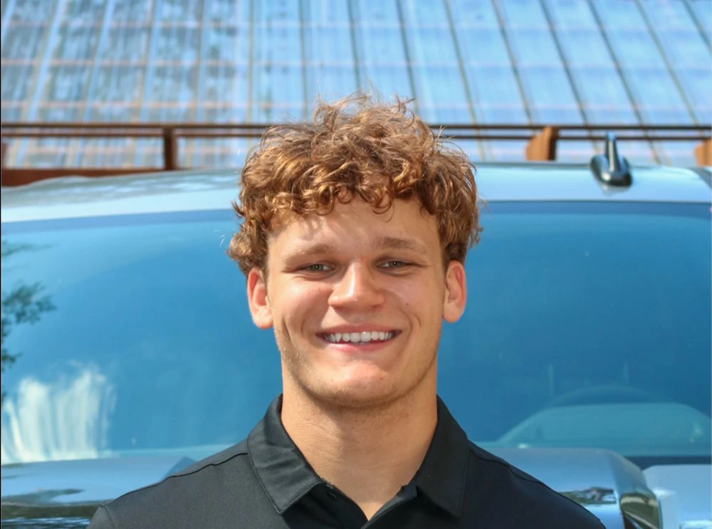 Karol Miklus in front of his truck
